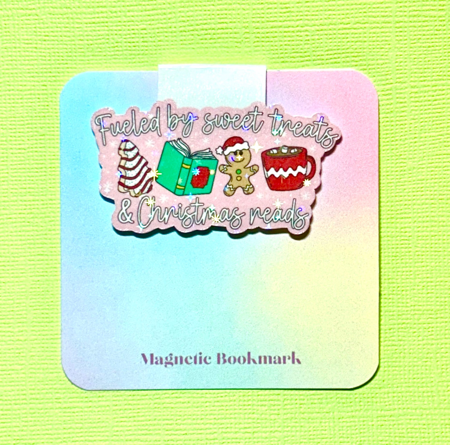 Fueled by sweet treats and Christmas reads holographic magnetic bookmark